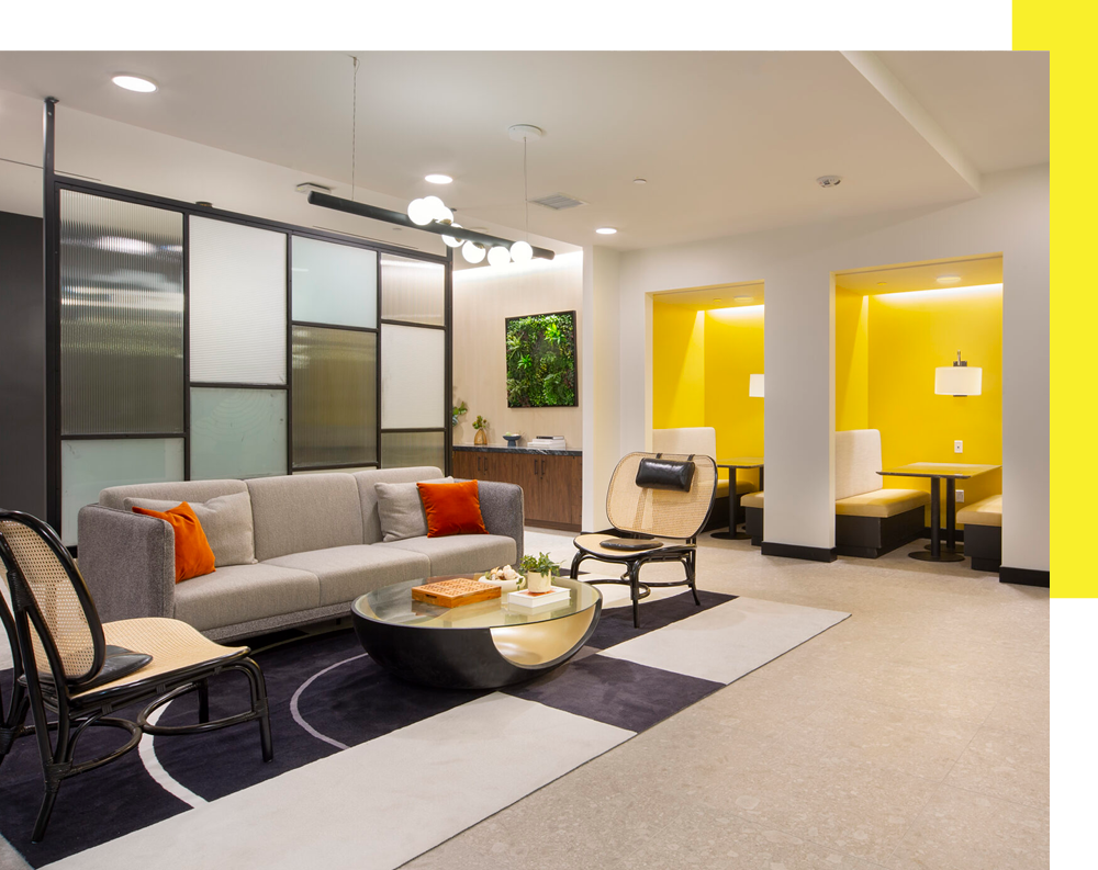 Co-working space with tables and seating areas