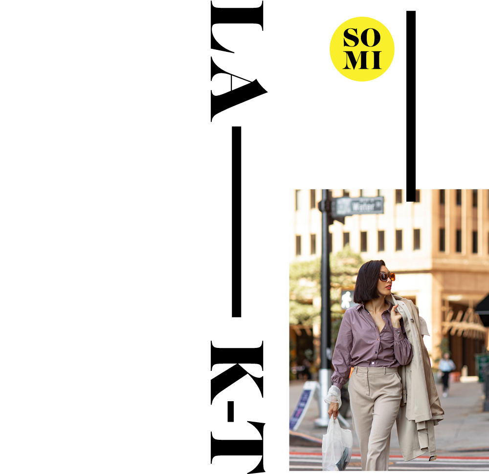 Graphics image with stylish woman walking in city